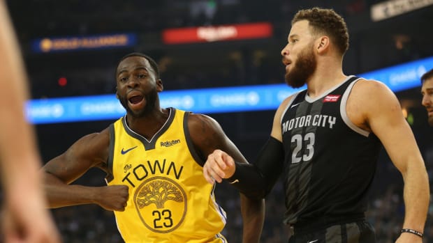 Mar 24, 2019; Oakland, CA, USA; Golden State Warriors forward Draymond Green (23) reacts after being called for a foul next to Detroit Pistons forward Blake Griffin (23) in the first quarter at Oracle Arena. Mandatory Credit: Cary Edmondson-USA TODAY Sports